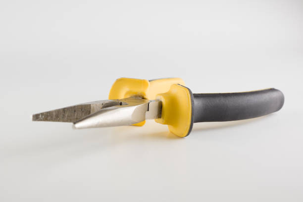 pliers with a long working part and dielectric handles are isolated on a white background