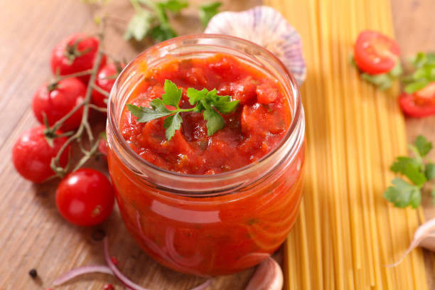 istock tomato sauce with spices and spahetti 1175708243