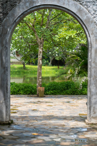 istock brick doorway arch to lake view 1175709024