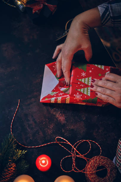istock Wrapping and Decorating Christmas Presents 1175710734