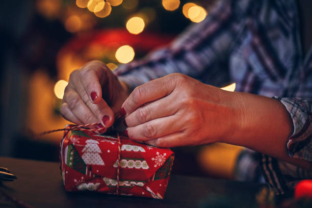 istock Wrapping and Decorating Christmas Presents 1175710738