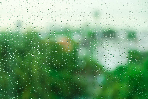 istock Water drop on glass mirror background. 1175712517