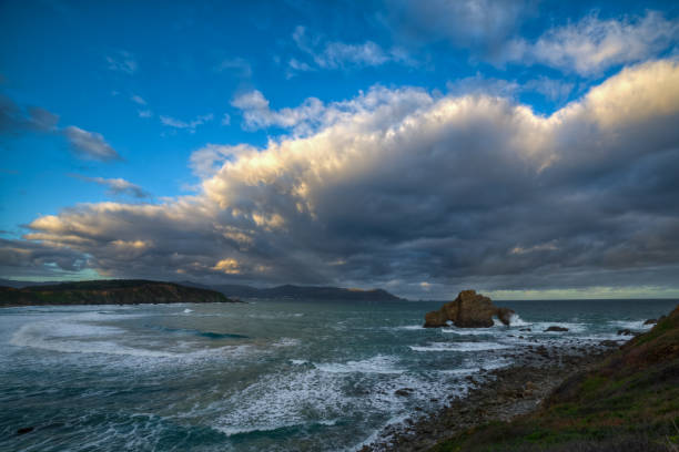 istock cloudy sunrise on the rocky coast 1175717742