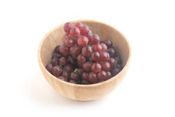 istock close up fresh red and purple grape on white background 1175717778