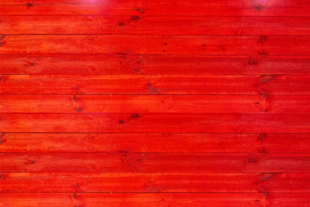 istock Red wood board surface of table or wall. Mock-up with copy space to add text and images. Linear pattern template for design and decoration purposes 1175718551