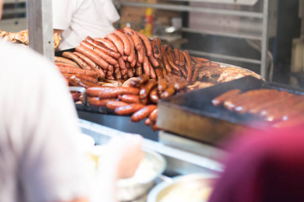 istock sausages fast food kiosk preparing meat 1175720906