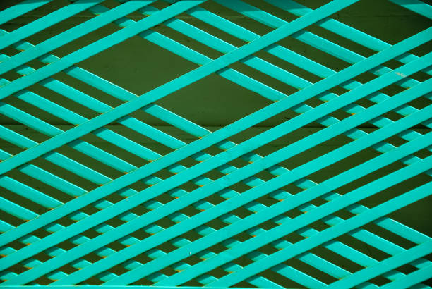 istock green Wooden bars net background, wood mesh. 1175721519