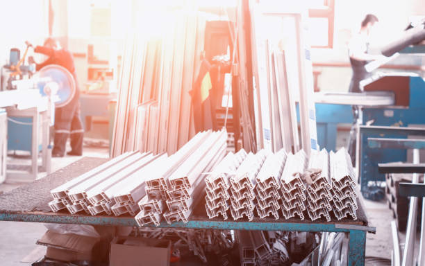 istock Production of pvc windows, workers in the workshop collect frames and pvc windows, workers 1175723836