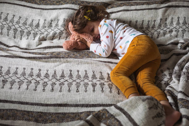 istock Little Girl Sleeping 1175724108