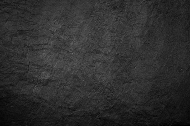 istock Dark grey and black slate background or texture 1175725677