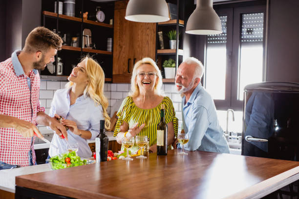 istock Family prepares lunch in the kitchen 1175727786