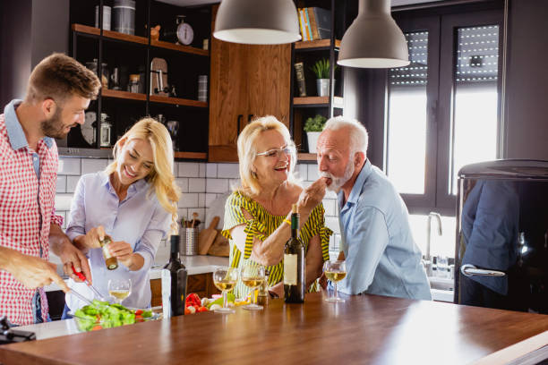 istock Family prepares lunch in the kitchen 1175727787