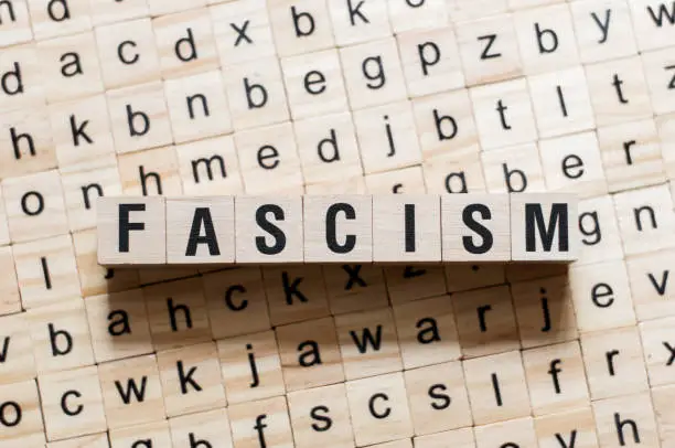 Fascism word concept on cubes.