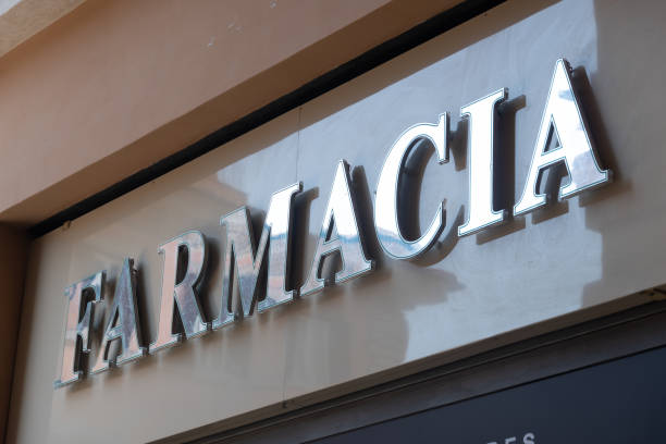 Italian pharmacy store sign Rome, Italy - August 22, 2019: Farmacia, Italian pharmacy store sign farmacia stock pictures, royalty-free photos & images