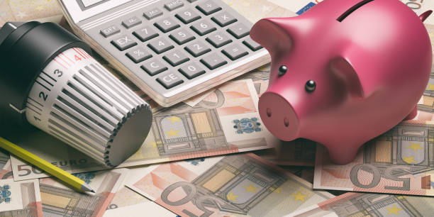 istock Radiator thermostat, heating temperature adjustment on euro bank notes. 3d illustration 1175732498