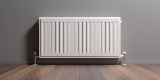 istock Radiator, wood floor, grey wall background, 3d illustration 1175732606