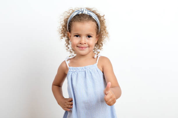 istock Girl sign ok 1175732700