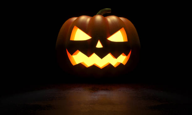 istock A glowing Jack O Lantern in a dark. 3D Rendering illustration 1175733615