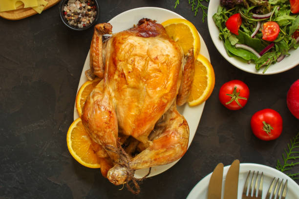 istock Traditional Thanksgiving day baked chicken or turkey, Christmas festive table setting (food table, a lot of dishes) menu concept. food background. copy space. Top view 1175734021