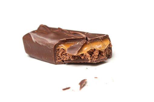 Closeup of chocolate bar on white background