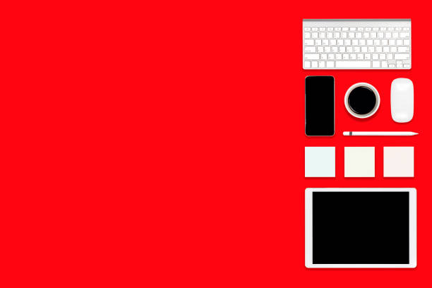 Flat lay of office table with digital tablet, mobile phone and accessories.