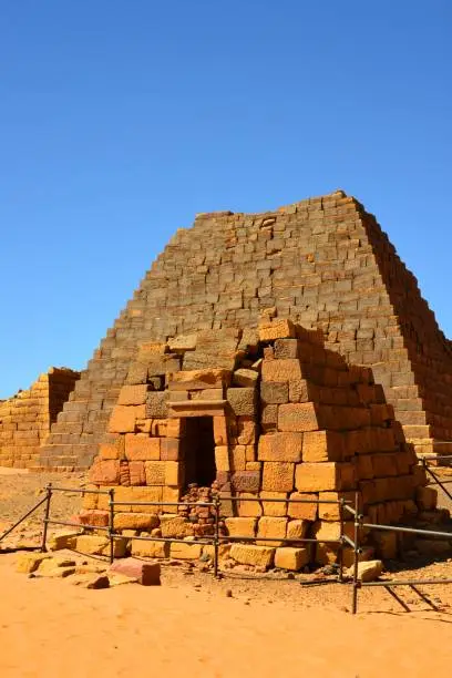 Meroe, Begarawiyah, Kush, Sudan: Nubian pyramids of Meroe, tombs of the Kushite kingdoms - Archaeological Sites of the Island of Meroe - UNESCO World Heritage Site - dated c. 800 BCE – c. 350 CE - pyramids N16 - King Akhyesteme (foreground) and N7, King Arqamani (Merqetek)