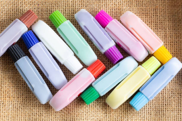 istock Watercolor equipment, with 12 colors, brown background 1175740104