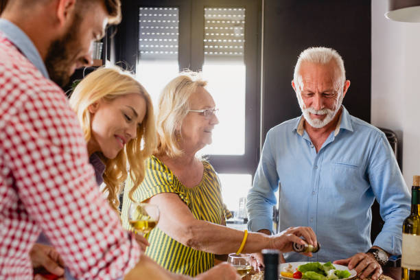 istock Family prepares lunch in the kitchen 1175741220