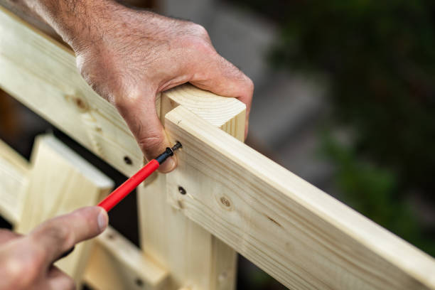 istock Craftsman at work on wooden boards. 1175745309
