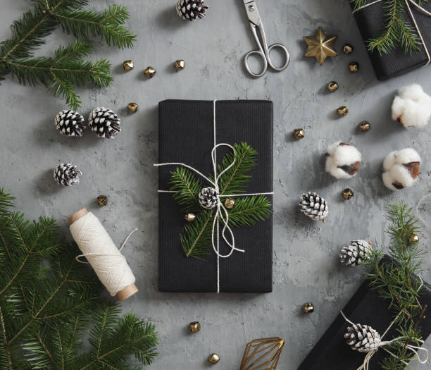 istock Christmas presents wrapped in black paper 1175745787
