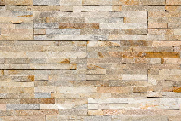 istock Decorative texture of a  wall with rectangular parts of stone.