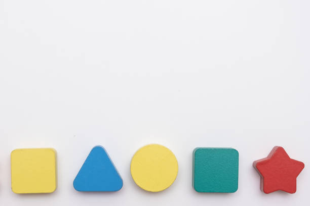 istock On a white background in a chaotic manner are large multi-colored children's figures. copy space 1175747054