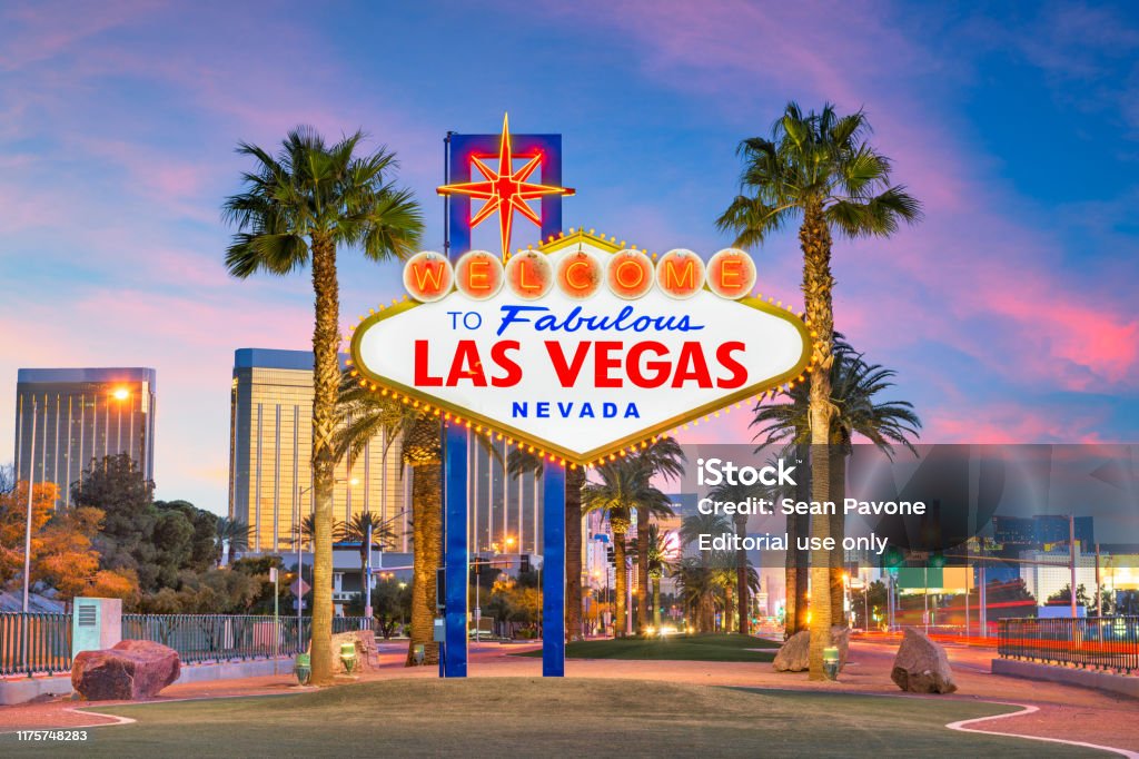 Las Vegas, Nevada, USA at the Welcome Sign Las Vegas, Nevada, USA at the Welcome to Las Vegas Sign at dusk. Las Vegas Stock Photo