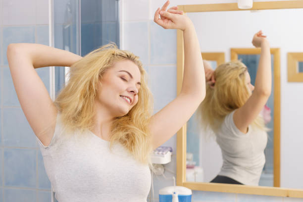 istock Happy fresh blonde woman in bathroom 1175748521