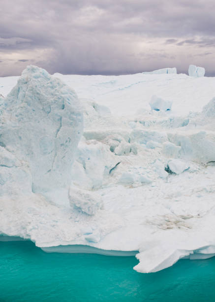istock Arctic icebergs in Greenland, drone view. 1175750930