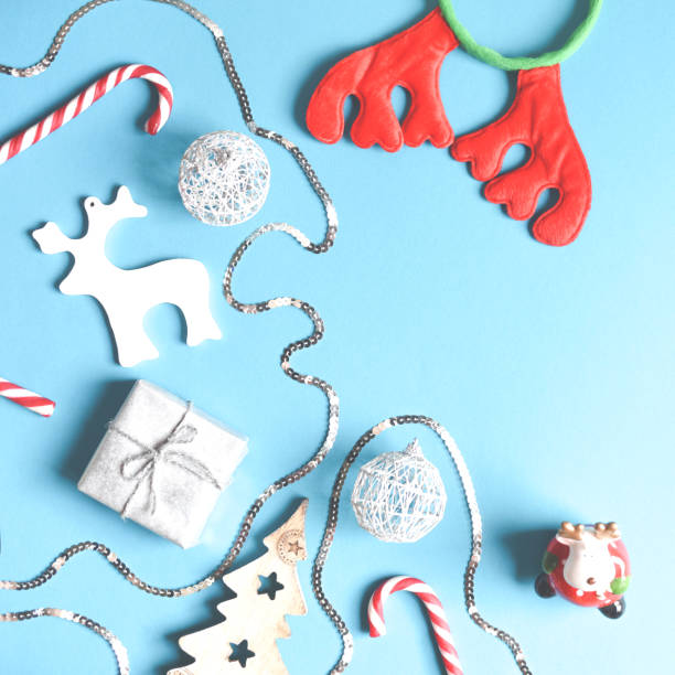 istock Cute Christmas flat lay on a blue background. 1175750994