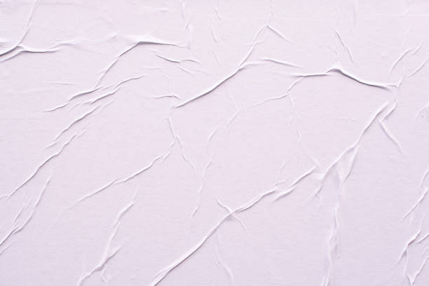 istock White sheet of crumpled paper. 1175758951