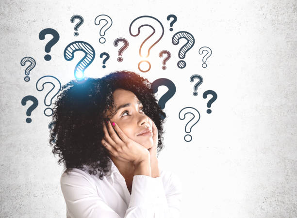 istock Young African woman and question marks 1175762229