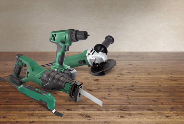 istock Group of heavy-duty power tools on an industrial background 1175763760