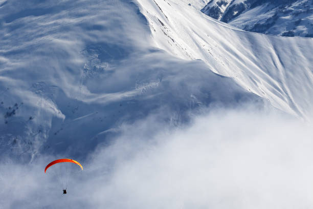Tandem paragliding in Switzerland Alps, outdoor leisure activity in Interlaken