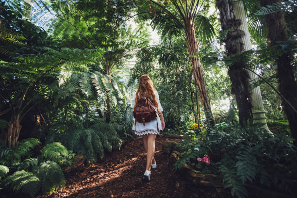istock Young woman in tropical environment 1175766547