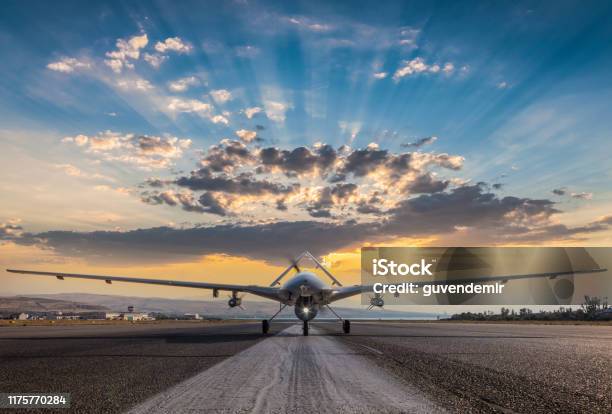 Armed Unmanned Aerial Vehicle On Runway Stock Photo - Download Image Now - Unmanned Aerial Vehicle, Military, Drone