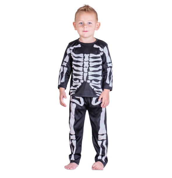 istock Young boy in a black skeleton costume 1175772024