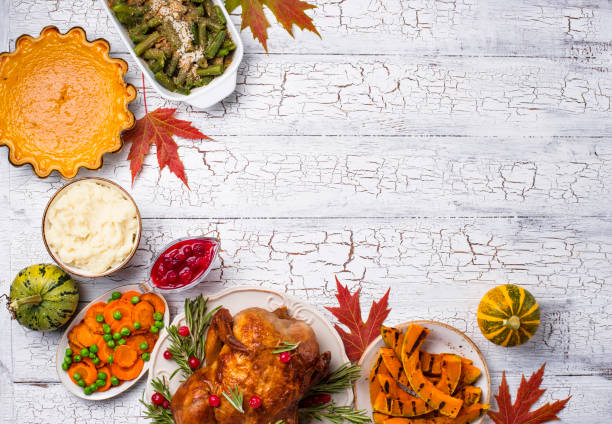 Thanksgiving Day traditional festive dinner Thanksgiving Day traditional dinner. Baked turkey, pumpkin pie, green beans casserole and mashed potato happy green peas stock pictures, royalty-free photos & images