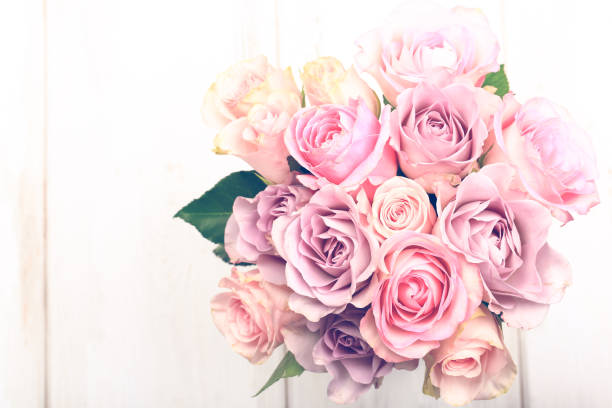 istock bouquet of pink roses isolated on light background 1175775687