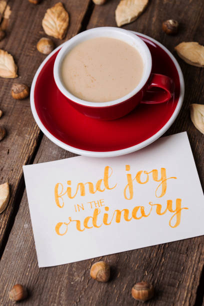 istock red cup of coffee and leaf shape cookies