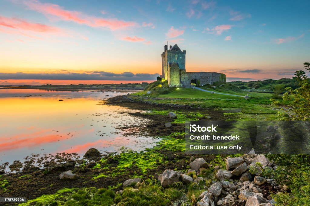 Dunguaire Castle on shores of Galway Bay Ireland Dunguaire Castle on the shores of Galway Bay Ireland during a beautiful sunset Ireland Stock Photo