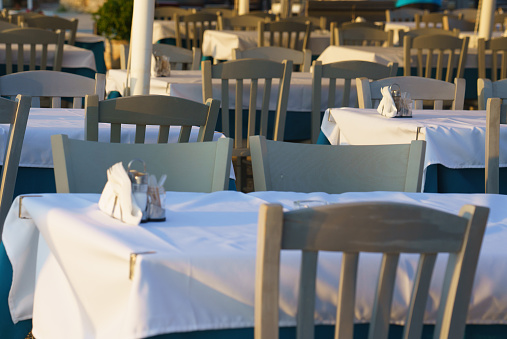 Empty tables in Perea, Thessaloniki, Greece