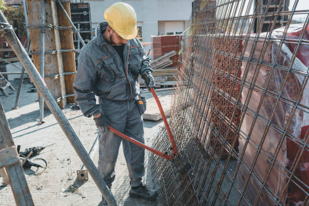 istock Construction Worker with Scissors for Metal is Working at the Rooftop 1175794255
