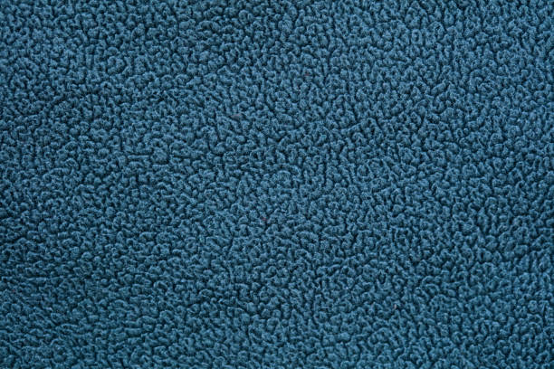 Close shot of simple blue fleece fabric Top view of blue fleece fabric fleece photos stock pictures, royalty-free photos & images